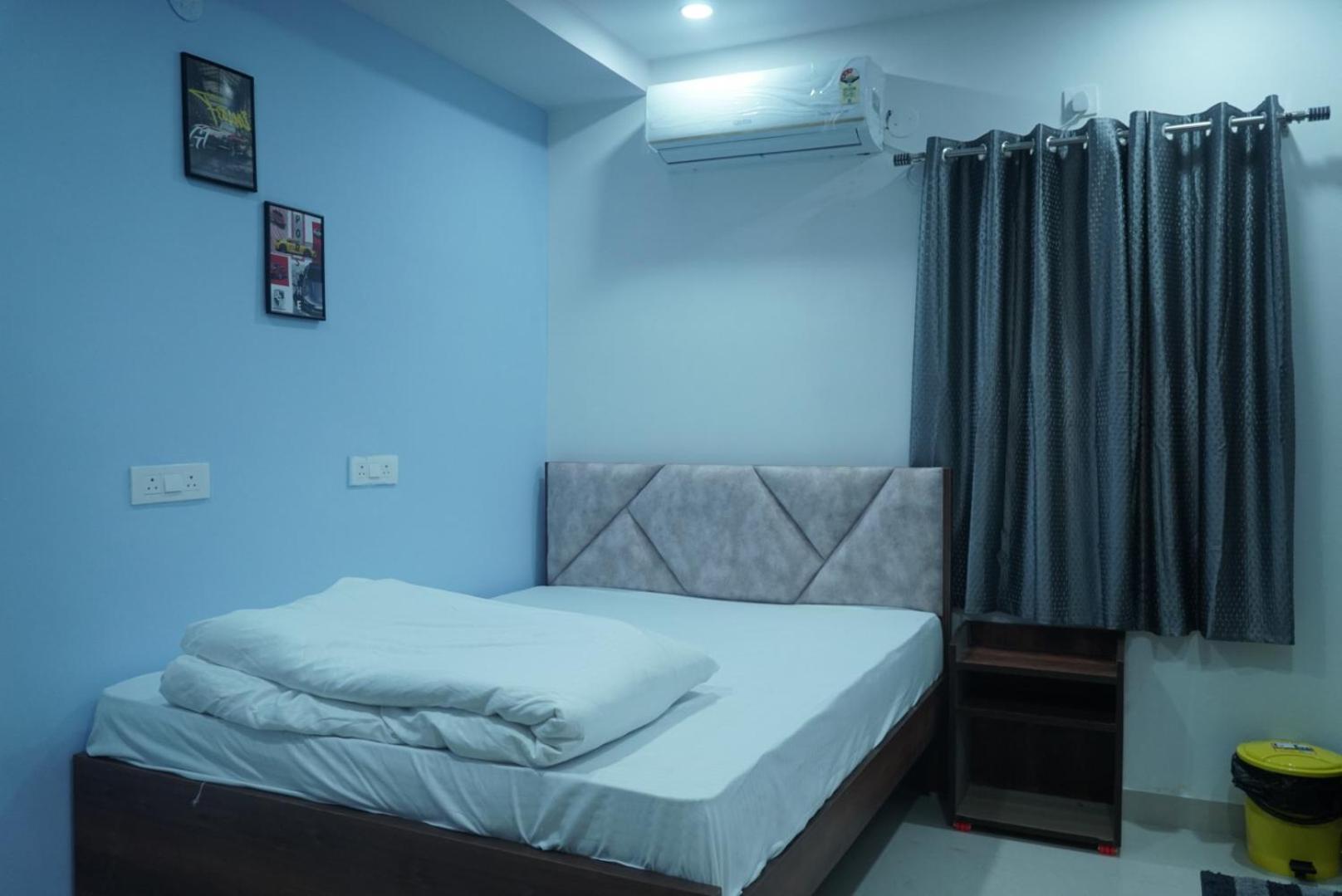 Cosmic Hotel & Guest House Gachibowli Raidurg Hyderabad Exterior photo